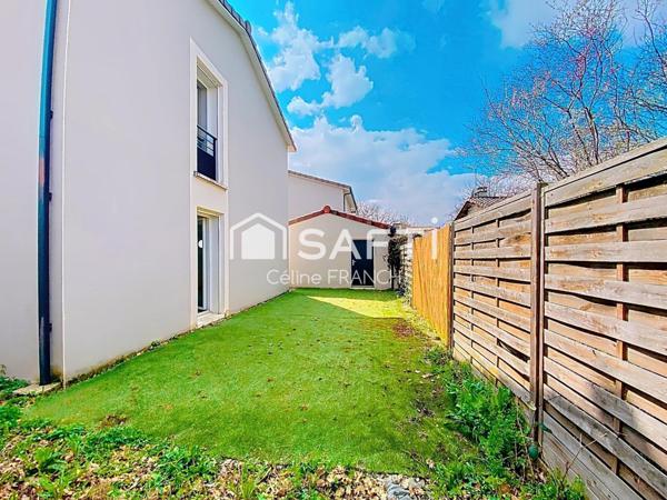 Maison fonctionnelle avec garage et jardin