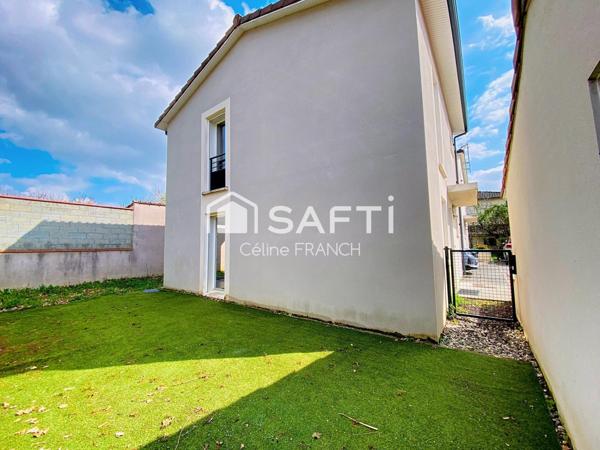 Maison fonctionnelle avec garage et jardin