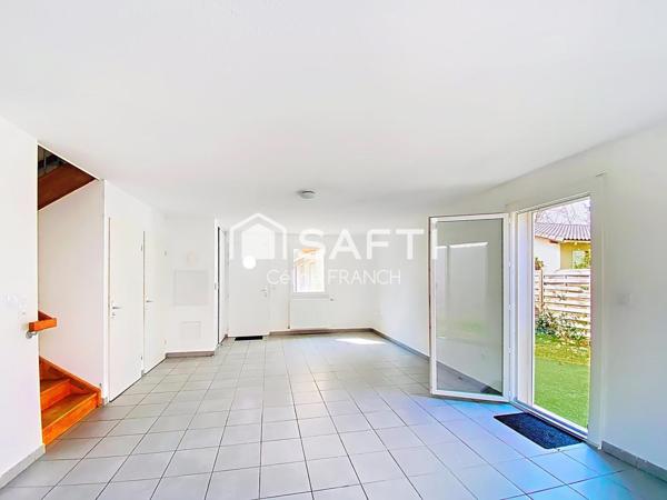 Maison fonctionnelle avec garage et jardin