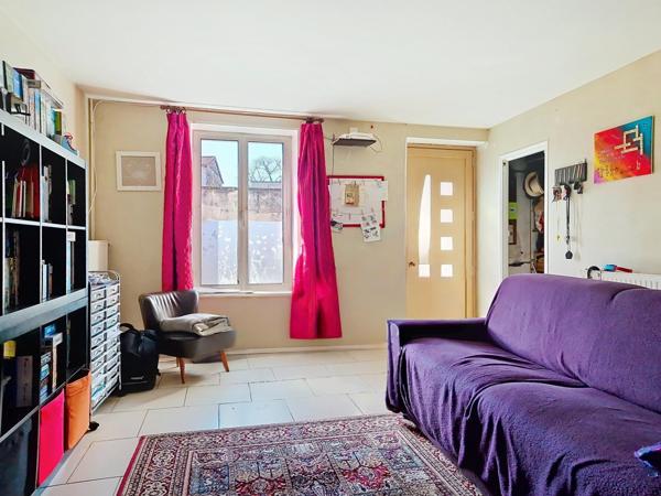 Maison de ville avec extérieur au cœur de Ville.