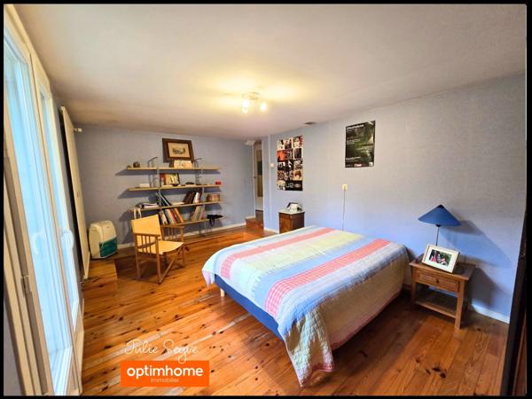 Maison individuelle de 170m² avec 6 chambres, un bureau et un sous-sol complet avec garage sur parcelle de 2006 m²