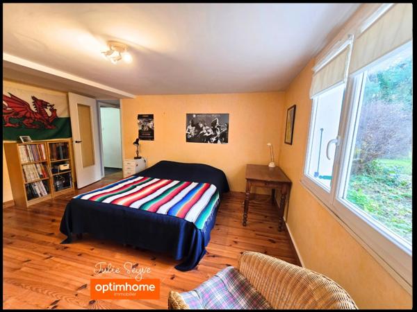 Maison individuelle de 170m² avec 6 chambres, un bureau et un sous-sol complet avec garage sur parcelle de 2006 m²