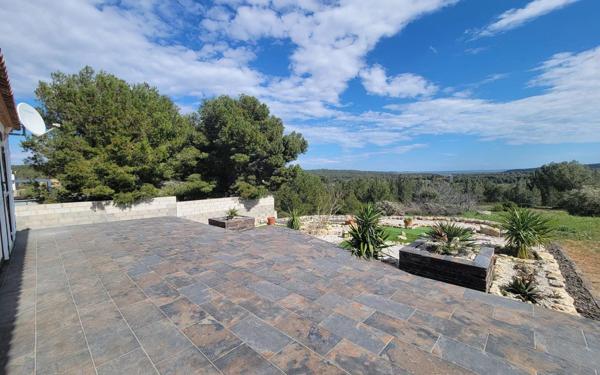 Villa plain pied 4 faces de 134m² sur terrain paysagé de 1470m²