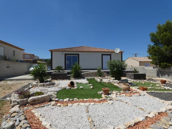 Villa plain pied 4 faces de 134m² sur terrain paysagé de 1470m²