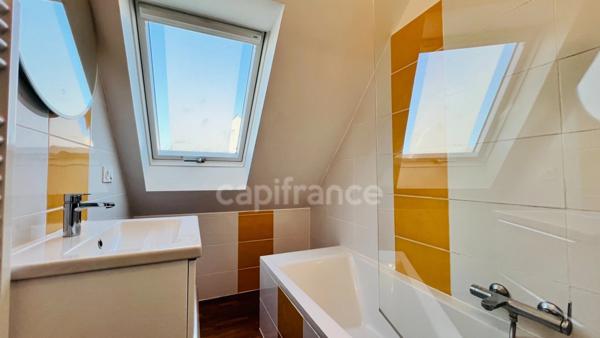 Quimper (29) - Maison centre ville de 75,21 m² habitable - 124 m² utiles - Terrasse - Double garage.