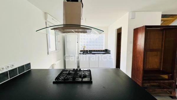 Quimper (29) - Maison centre ville de 75,21 m² habitable - 124 m² utiles - Terrasse - Double garage.