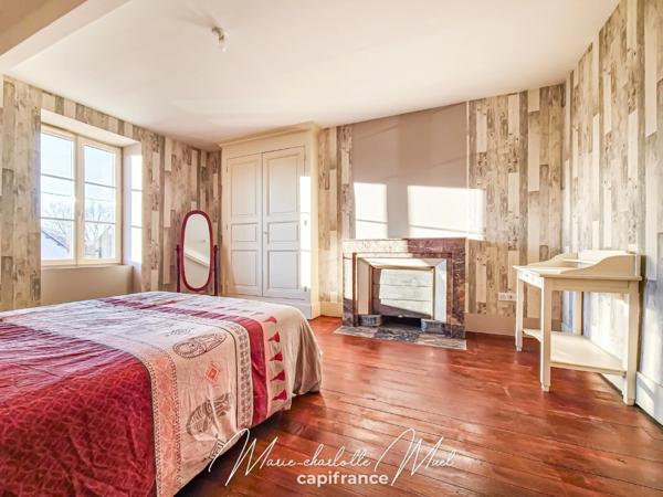 Grande maison de ville avec terrasse de 70 m² et garage, rénovée avec cachet et authenticité