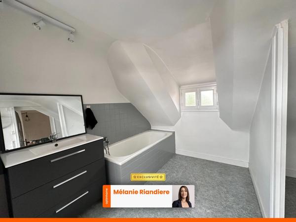 Maison de ville 3 chambres avec grand garage, jardin et sous-sol