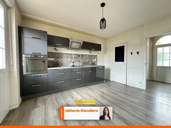 Maison de ville 3 chambres avec grand garage, jardin et sous-sol