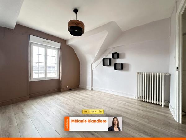 Maison de ville 3 chambres avec grand garage, jardin et sous-sol