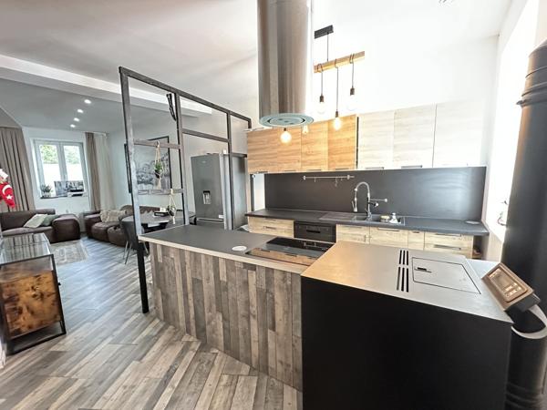 Appartement en triplex avec garage