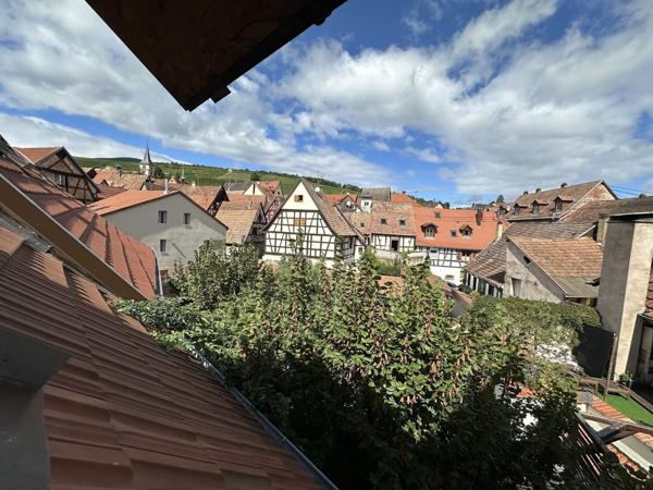 Appartement en triplex avec garage