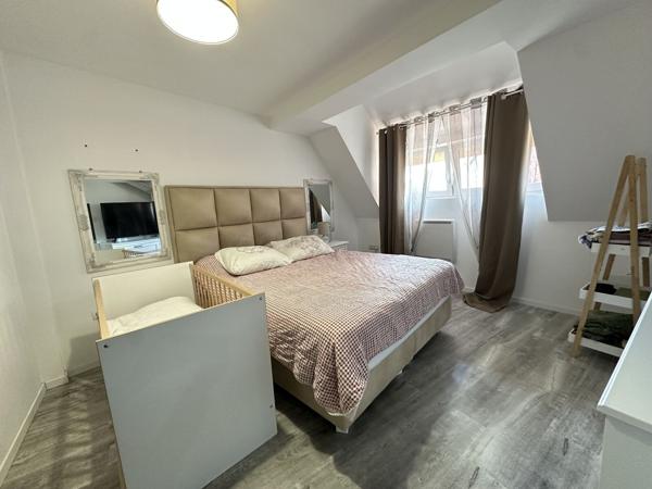 Appartement en triplex avec garage