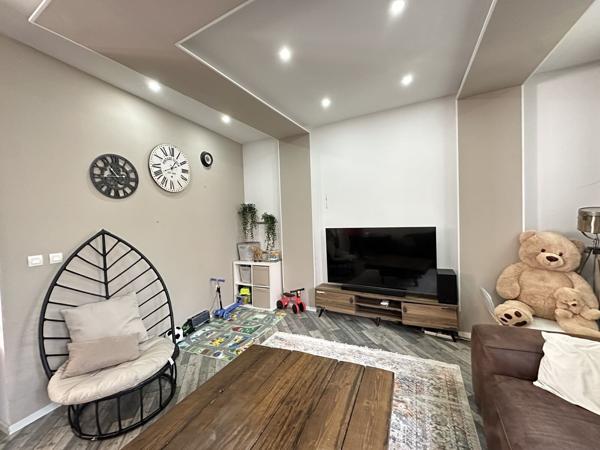 Appartement en triplex avec garage