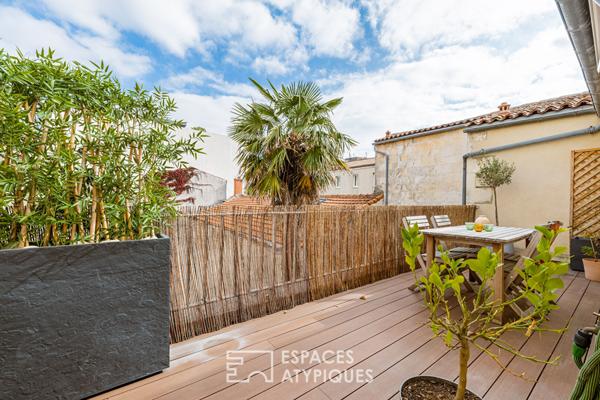 Appartement avec terrasse et finitions soignées proche du marché