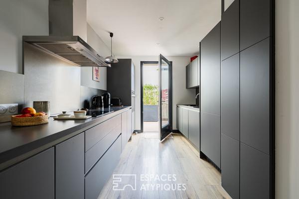 Appartement avec terrasse et finitions soignées proche du marché