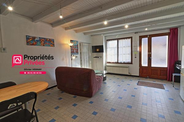 Maison mitoyenne de 2 appartements (91 m²) + combles (120m²)