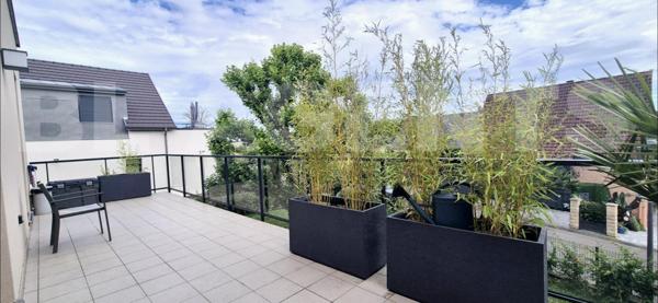 Appartement 3 pièces de 74 m² avec terrasse, garage et parking