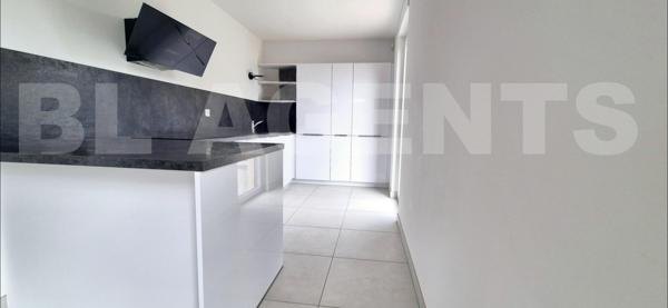 Appartement 3 pièces de 74 m² avec terrasse, garage et parking