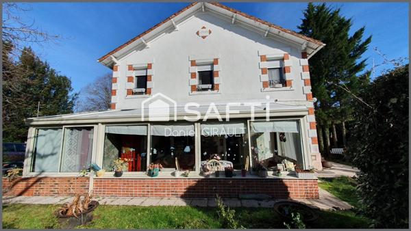 Charmante maison en pierre et brique, beau terrain avec un puit, garage