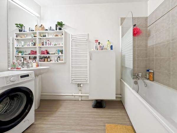 F3 au coeur de ville avec terrasse et 1 place de parking en sous sol