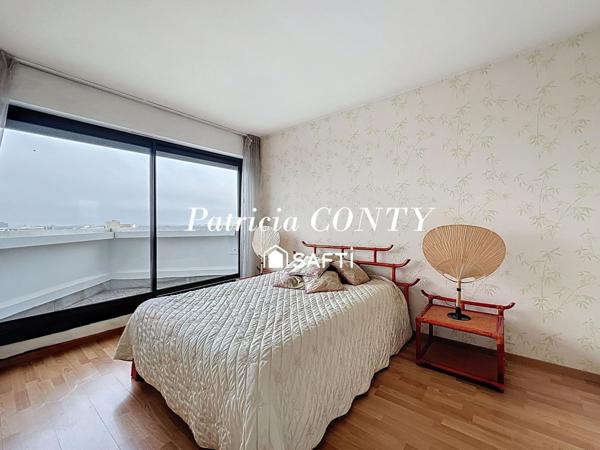 Grand 3P avec superbe vue sur le lac et sur Paris