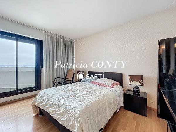 Grand 3P avec superbe vue sur le lac et sur Paris