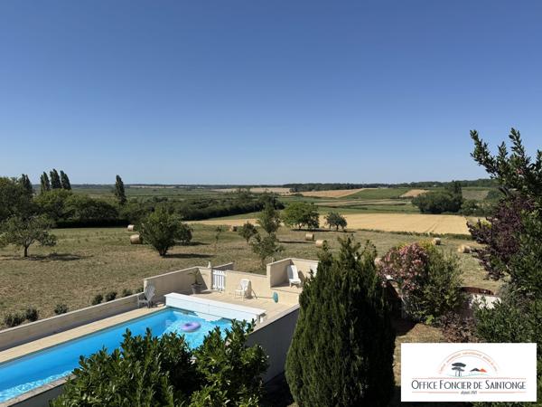 Propriété comprenant une maison principale d'habitation et 3 gites indépendants