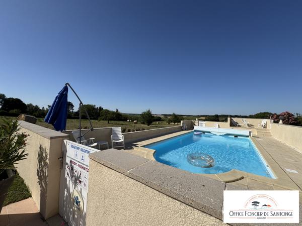 Propriété comprenant une maison principale d'habitation et 3 gites indépendants