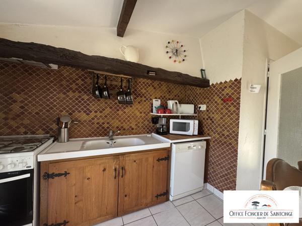 Propriété comprenant une maison principale d'habitation et 3 gites indépendants