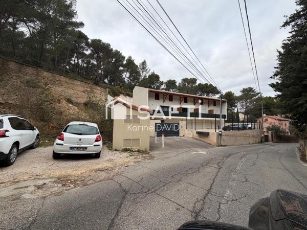 T2 + véranda, garage et place de parking