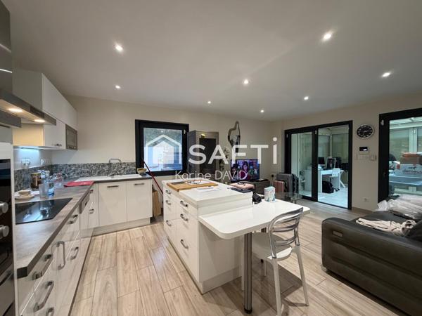 T2 + véranda, garage et place de parking