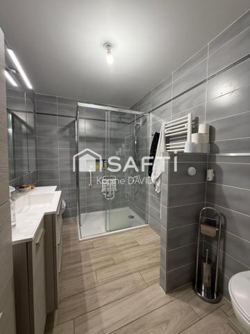 T2 + véranda, garage et place de parking