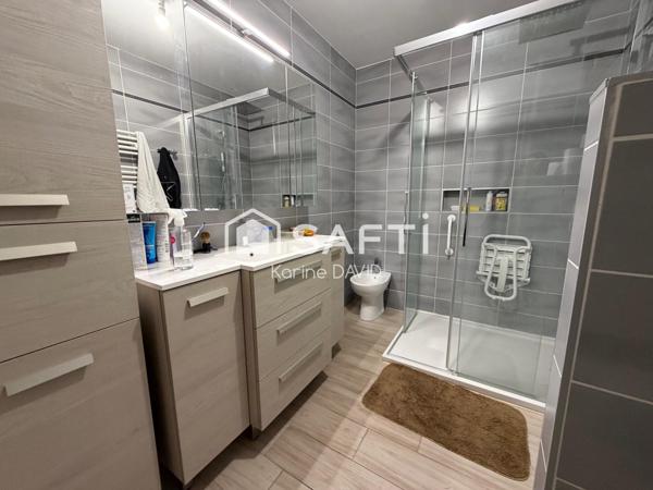 T2 + véranda, garage et place de parking