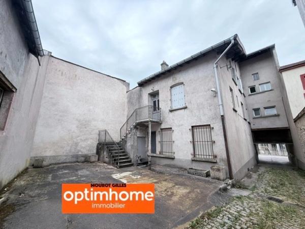 Immeuble de rapport avec commerce et logements – Bruyères centre-ville (88)