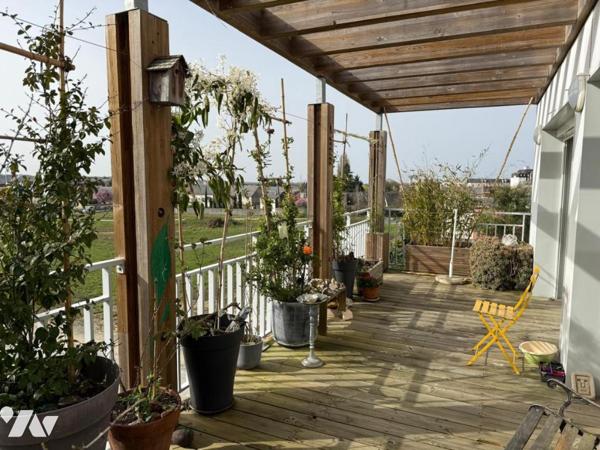 T4 de 93 m² avec balcon plein sud – Habitat participatif dans immeuble écologique récent (2021)