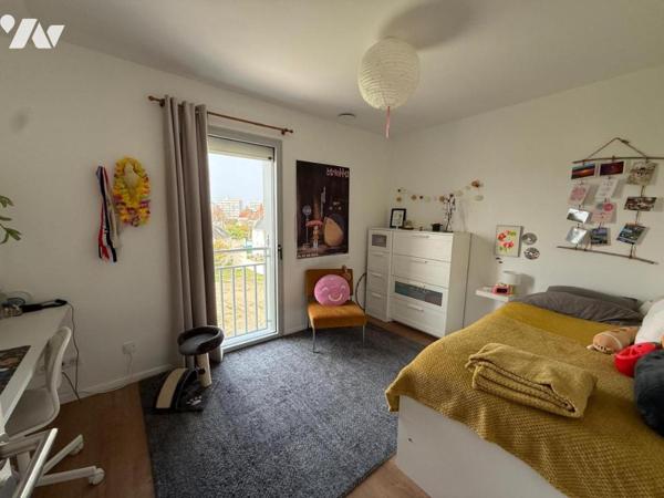 T4 de 93 m² avec balcon plein sud – Habitat participatif dans immeuble écologique récent (2021)