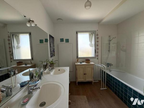 T4 de 93 m² avec balcon plein sud – Habitat participatif dans immeuble écologique récent (2021)