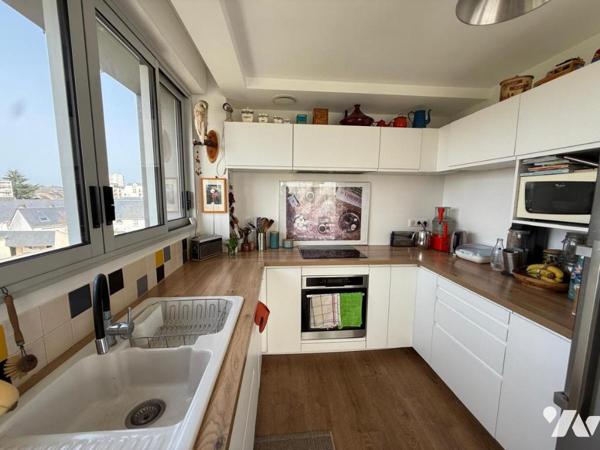 T4 de 93 m² avec balcon plein sud – Habitat participatif dans immeuble écologique récent (2021)