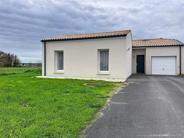 Maison contemporaine de plain-pied 3 chambres, garage, jardin