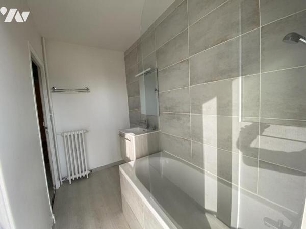 Appartement 4 pièces avec garage et cave 