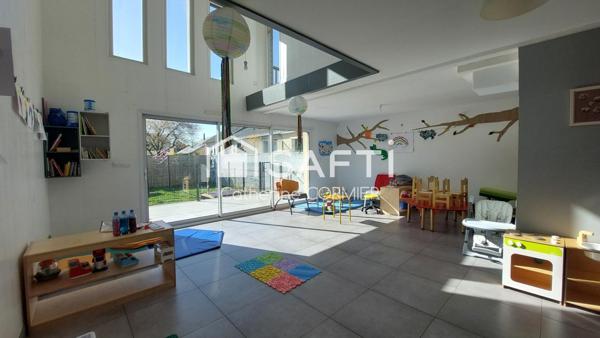 Maison en monopropriété  de 127 m² avec jardin