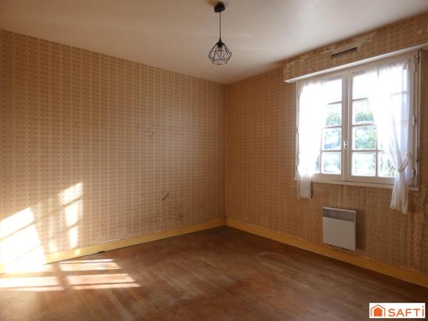 Maison avec vie de plain-pied située proche des commodités