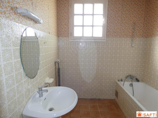 Maison avec vie de plain-pied située proche des commodités