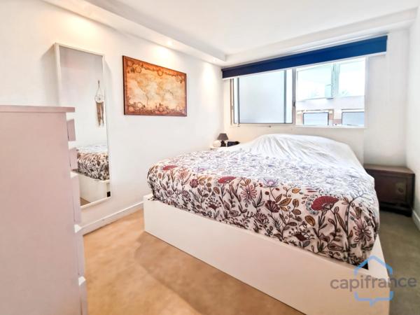 Appartement rénové de 76m² avec terrasse et place de parking