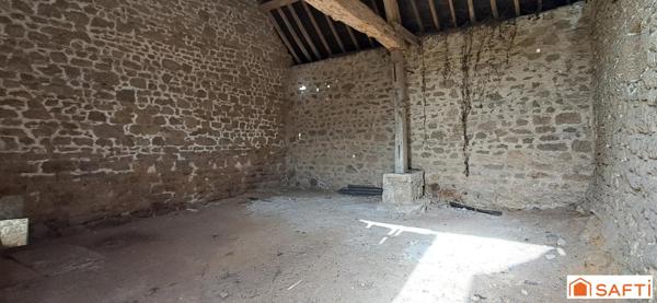 Grange de 70m² au sol avec terrain et puits