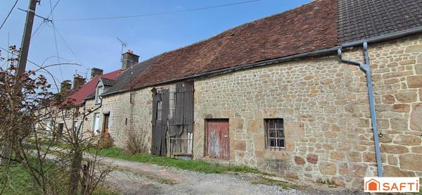 Grange de 70m² au sol avec terrain et puits