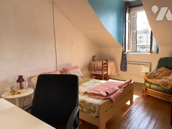 Maison d'habitation proche du centre ville et des écoles