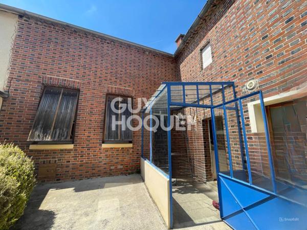 MAISON avec dépendances et garage à Monthelon