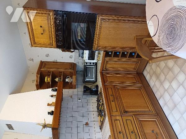 A OUTREAU, une maison d'habitation et son terrain.